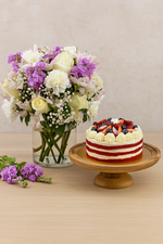 Load image into Gallery viewer, 1 Kg Chocolaty Red Velvet Cake With 50 Roses Arrangement
