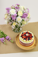Load image into Gallery viewer, 1 Kg Chocolaty Red Velvet Cake With 50 Roses Arrangement
