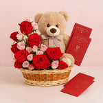 Load image into Gallery viewer, Teddy bear with a bouquet of red and pink roses and red envelopes on a light pink background

