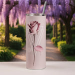 Load image into Gallery viewer, Tumbler with a rose design in a garden setting
