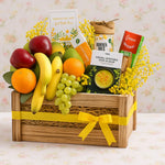 Load image into Gallery viewer, Fruit basket with a variety of fruits and snacks on a floral background
