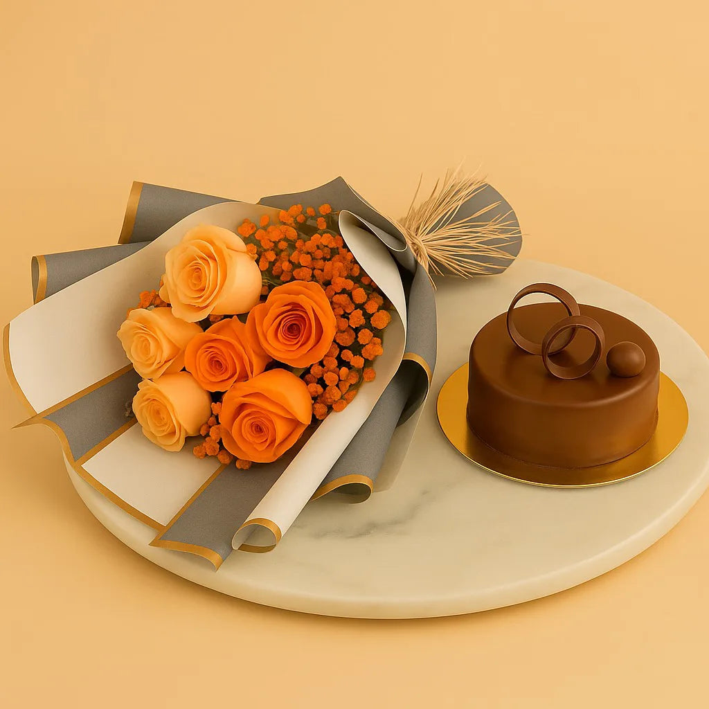 Bouquet of orange roses and decorative flowers with a small chocolate cake on a beige background